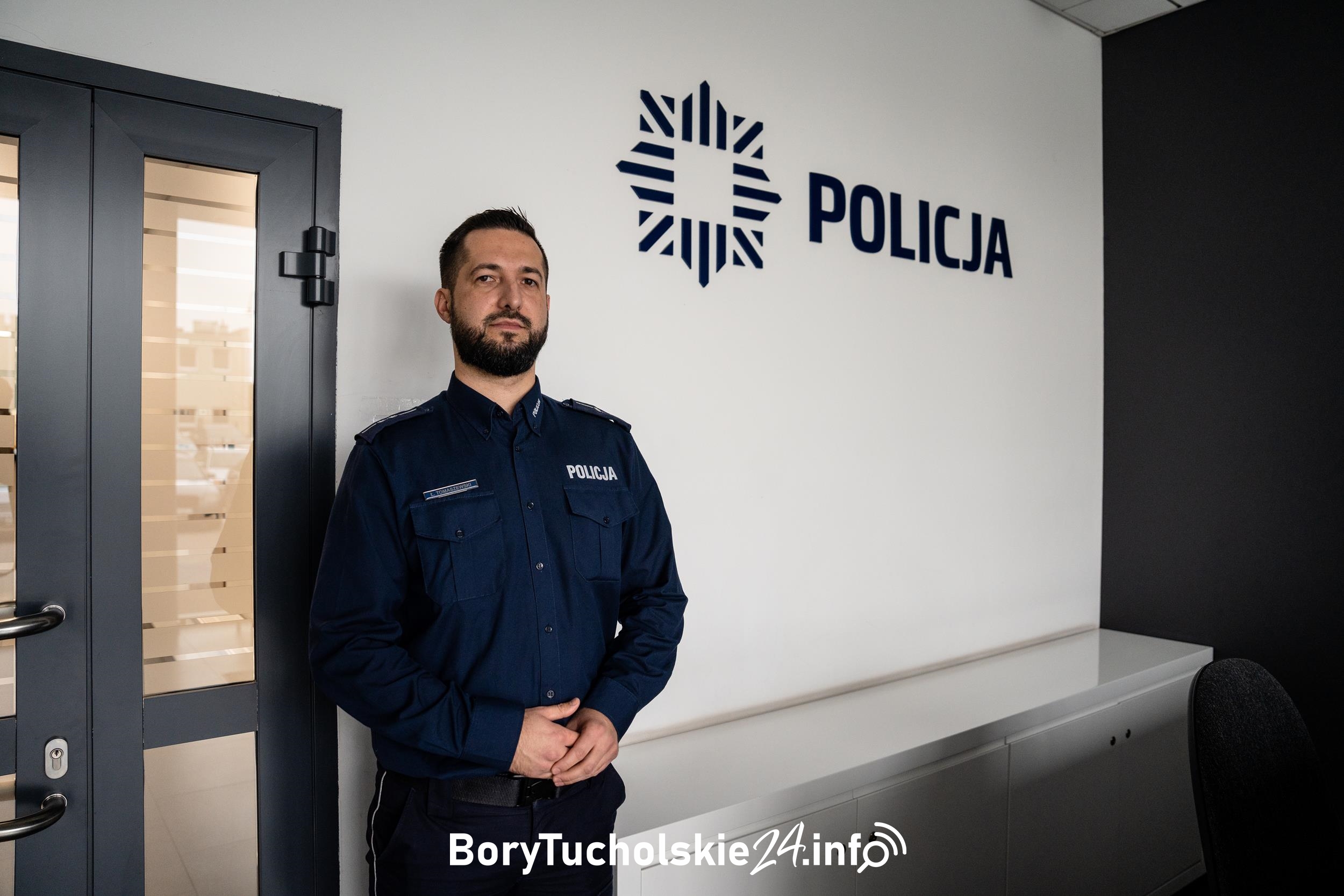 oficer prasowy Łukasz Tomaszewski